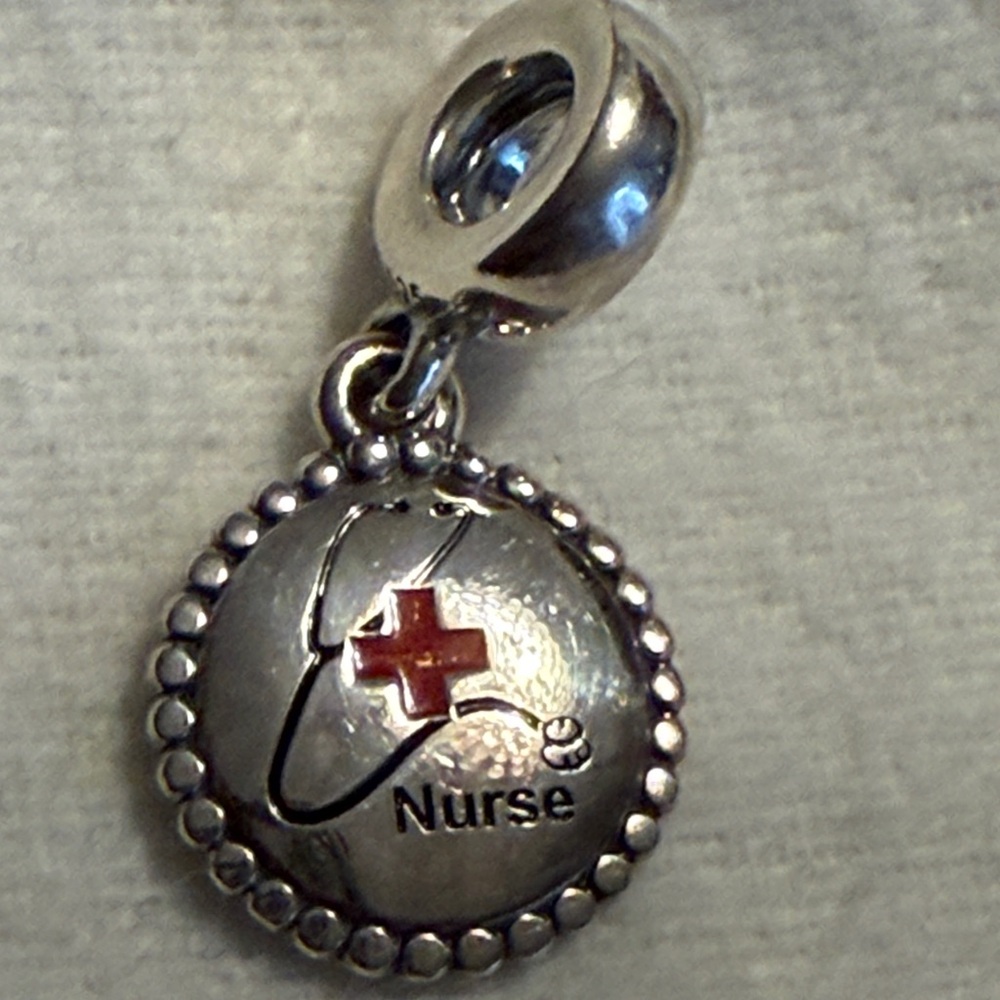 Pandora Silver Nurse Charm Bracelet.
